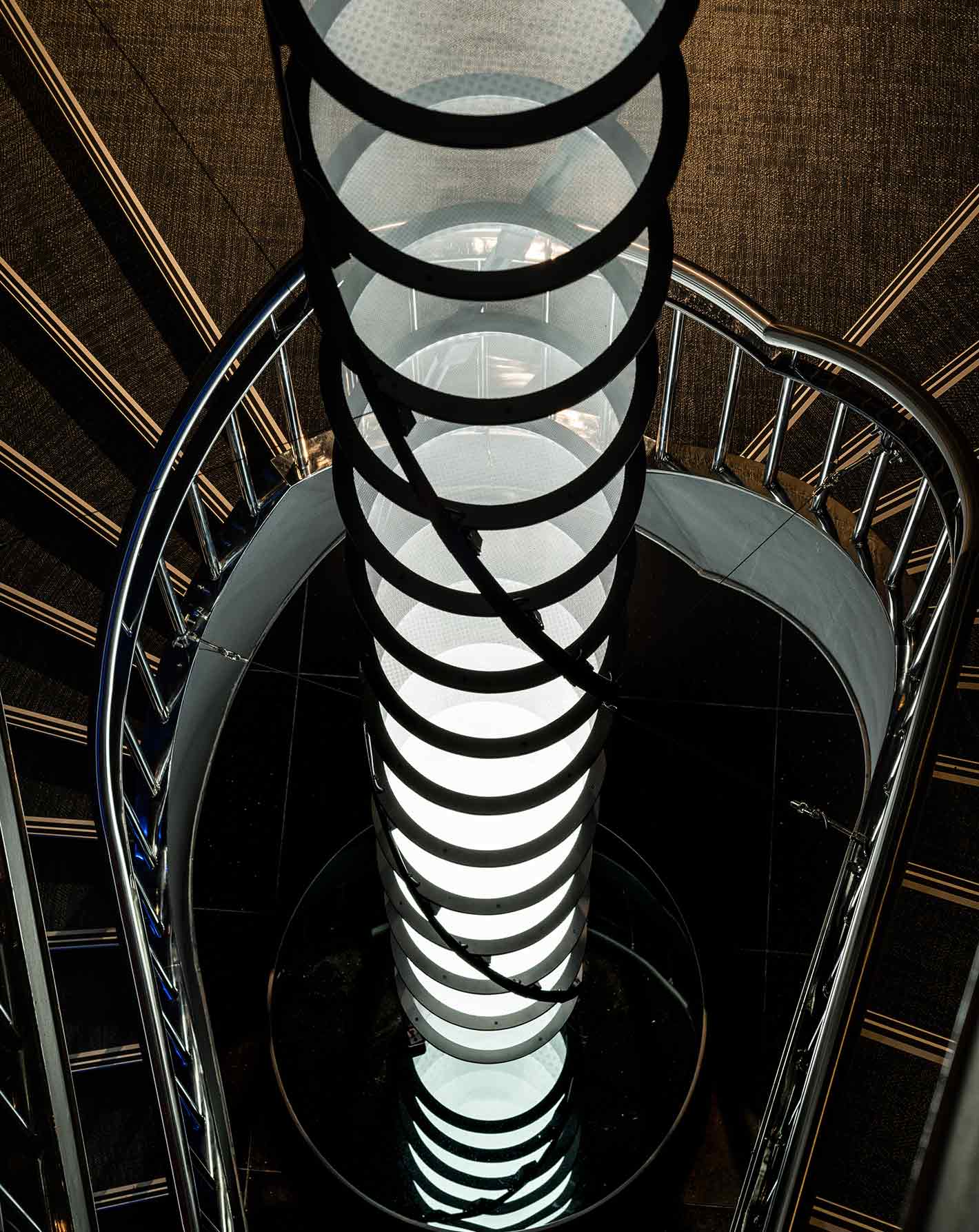 Stairwell Lighting Installation Pulsating Sequence Illuminated Circular Panels Helix Structure Park Row Soho Nulty Bespoke