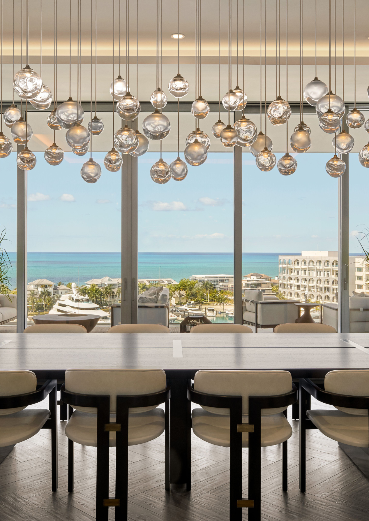 day time view of chandelier over dining table