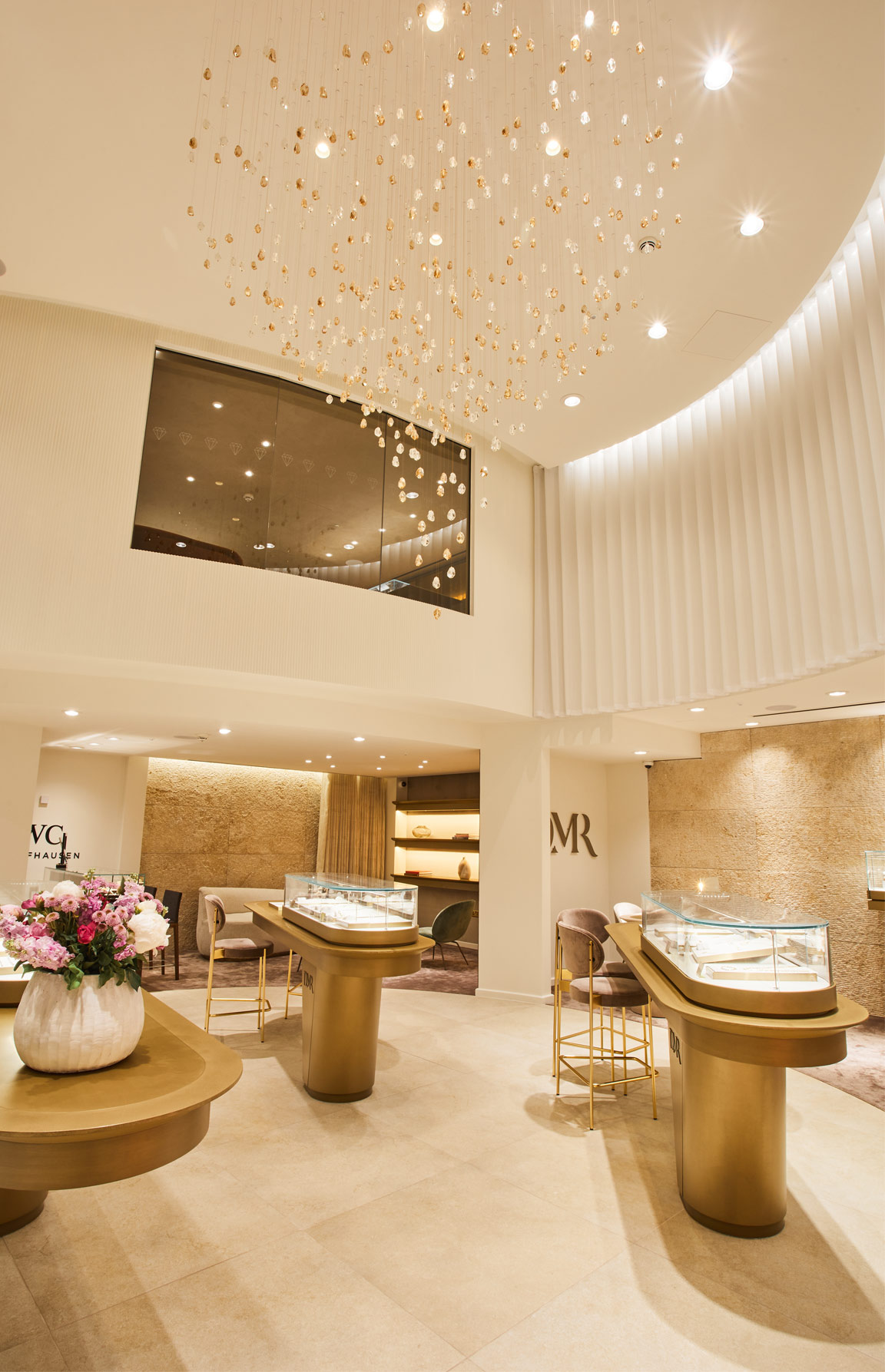 DMR Showroom Luxury Jewellery Store Liverpool Cast Acrylic Champagne Clear Suspended Glittering Feature Nulty Bespoke