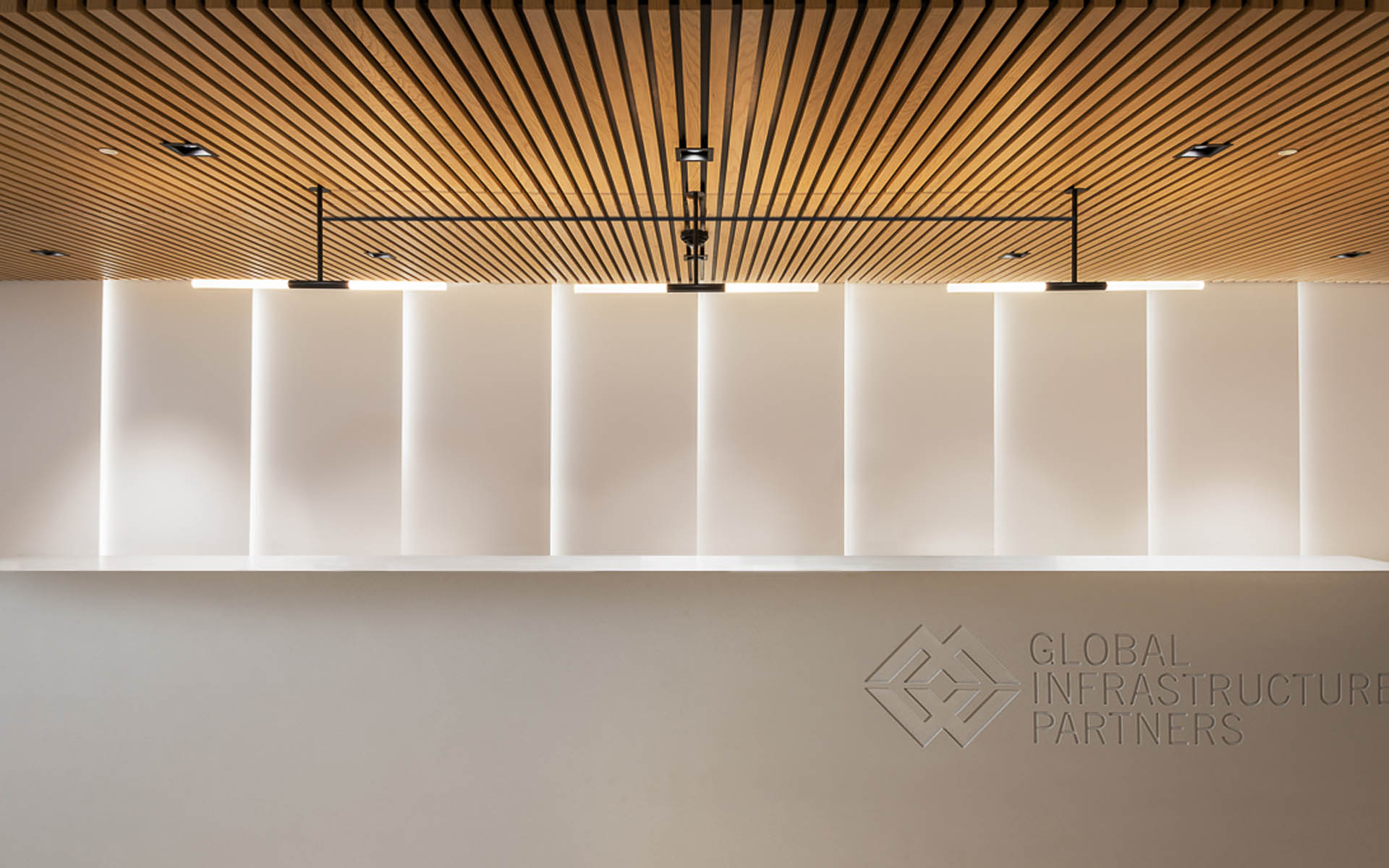 Custom Handcrafted Pendant Light Linear Batons Minimalist Sleek Design Office Reception Desk London Nulty Bespoke