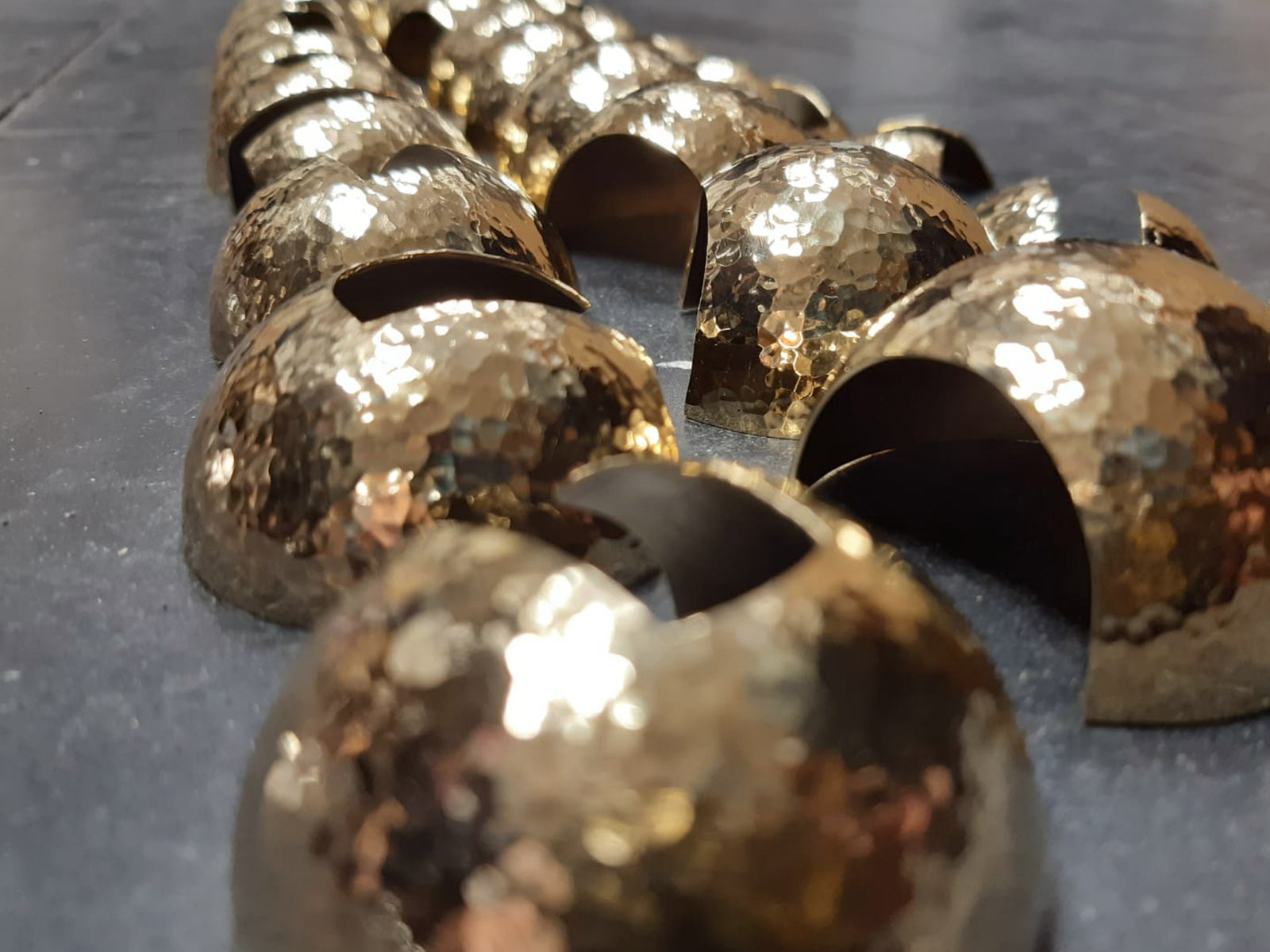 Hand Hammered Spherical Brass LED Casings Dappled Effect Custom Lighting Installation Designers Luxury Luminaires Nulty Bespoke